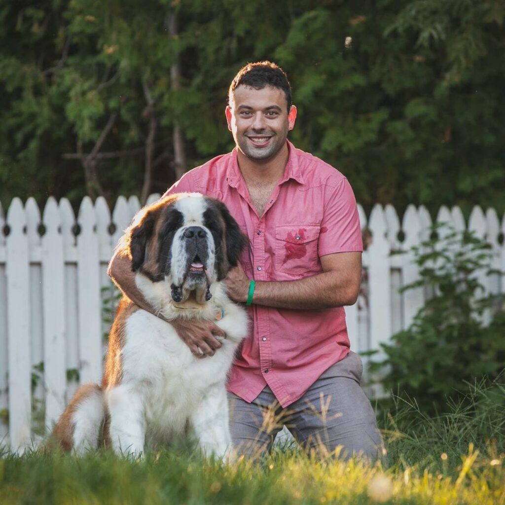 Eric and Dempsey his Saint Bernard